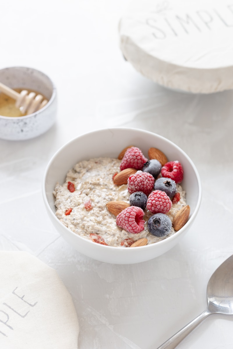 Healthy carbohydrates strawberries in white ceramic bowl